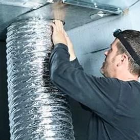 man performing Commercial Duct Cleaning